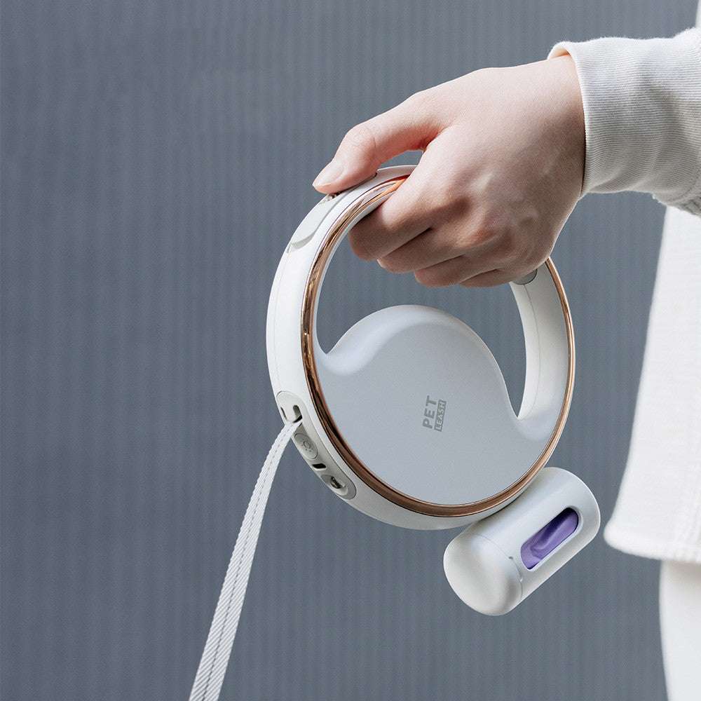 Automatic lighting retractable dog leash in white with LED night light and garbage bag storage box